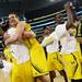 Michigan celebrates beating Florida to win the NCAA South Regional Championship and advancing to the Final Four at Cowboys Stadium on Sunday, March 31, 2013. Melanie Maxwell I AnnArbor.com